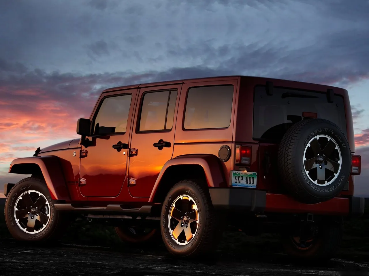 Jeep Wrangler Unlimited Altitude (2012) - Rear Three-Quarter