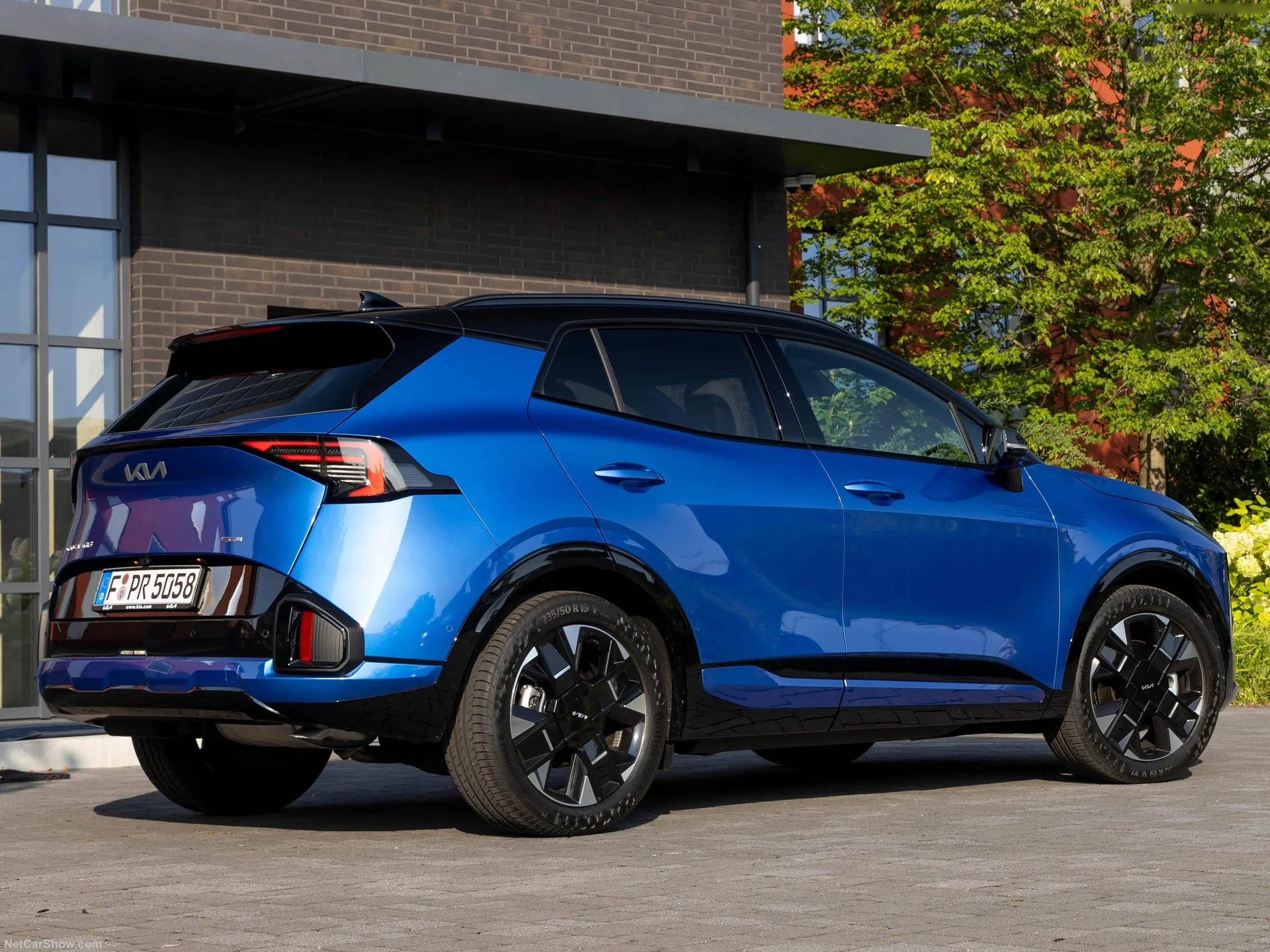 Kia Sportage [EU] (2026) – zadní tříčtvrteční pohled