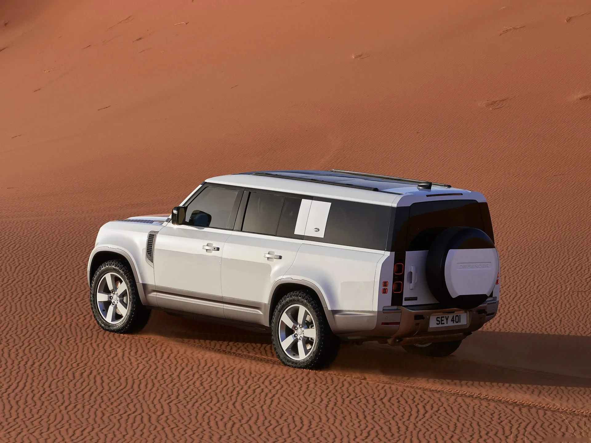Land Rover Defender 130 (2023) - Rear Three-Quarter
