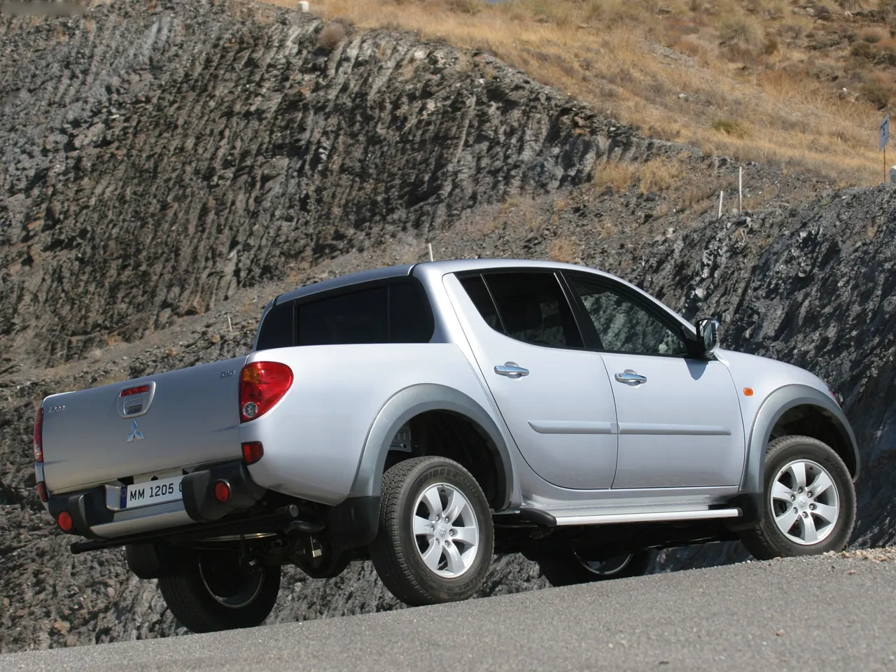 Mitsubishi L200 Double Cab (2007) – zadní tříčtvrteční pohled