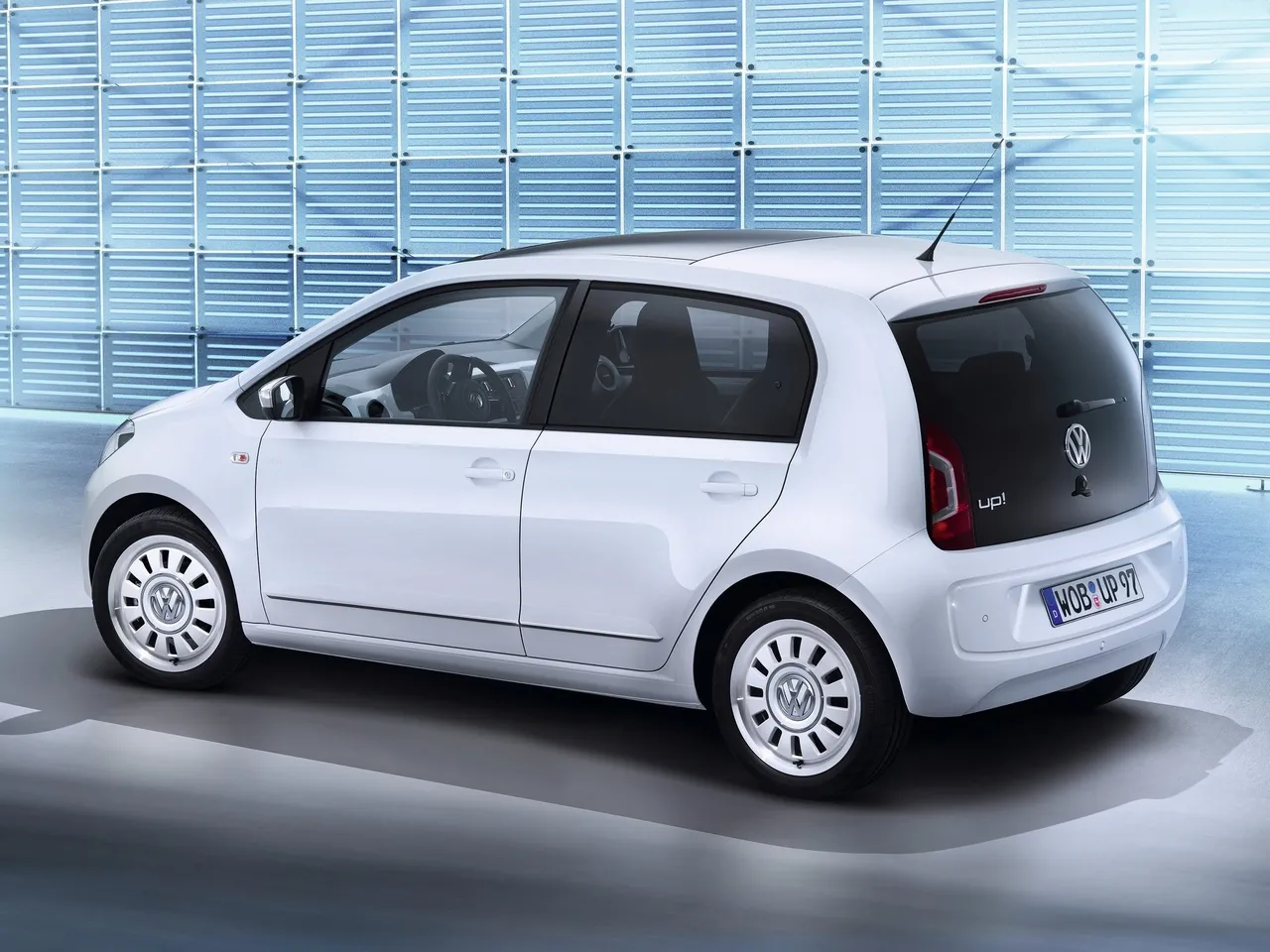 Volkswagen Up 4-door (2013) - Rear Three-Quarter