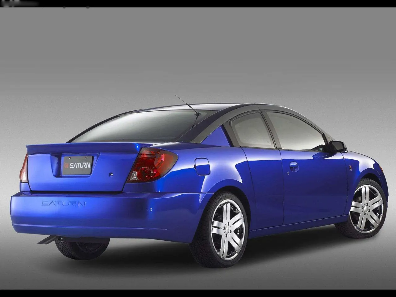 Saturn ION Quad Coupe (2003) – zadní tříčtvrteční pohled