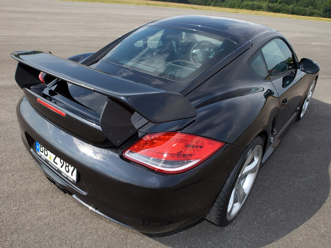 TechArt Porsche Cayman (2010) – zadní tříčtvrteční pohled
